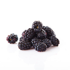 group of organic blackberries isolated on white background