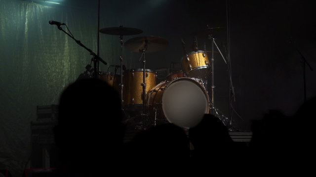 View of golden percussion and people waiting for a concert