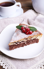 Tasty homemade pie on table
