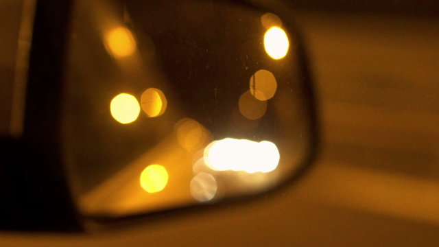 View of wing mirror at night