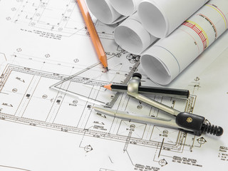 Architectural blueprint of office building with a pencils