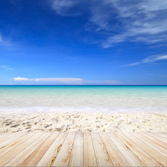Fototapeta na wymiar Wood table on blurred beach background
