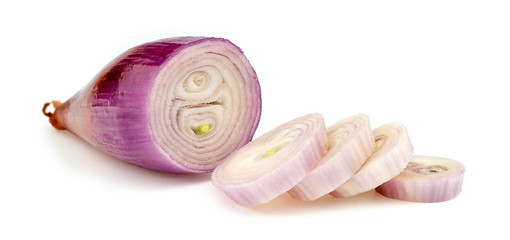 Pieces of echalion onion isolated on white