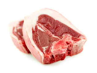 Raw uncooked lamb loin beef chop isolated on white in studio