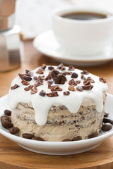 chocolate coffee cake with icing, close-up