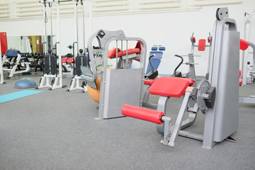 Fototapeta na wymiar Interior view of a gym with equipment