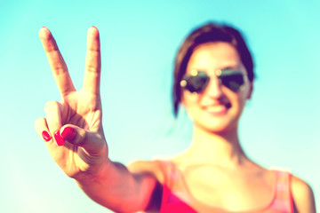 Retro Photo Of Young Girl With Victory Sign