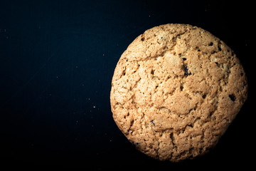 Oat cookies on the old shabby background. tinted. with space for