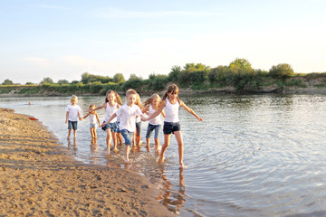 Portrait of children on the beach in summer