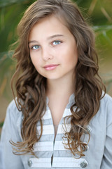 portrait of little girl in tropical style