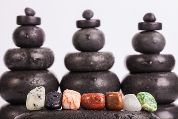 Row Of Chakra Crystals on hot massage stones - 75331654