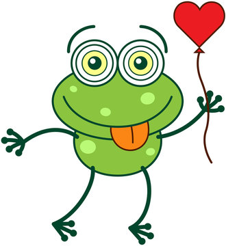 Green frog holding a red heart balloon and feeling in love