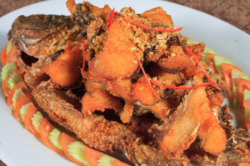Thai food style: Fried fish toppted with chilli sauce