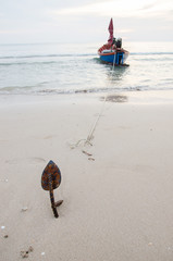 Fishing boat with anchor