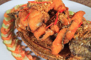 Thai food style: Fried fish toppted with chilli sauce