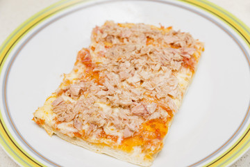 preparing the pizza dough with cheese