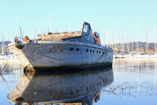 shipwrecked abandoned motor boat