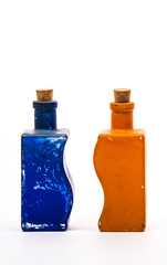 Two glass decorative bottles