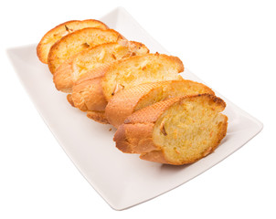 Homemade garlic bread of French baguette slices 
