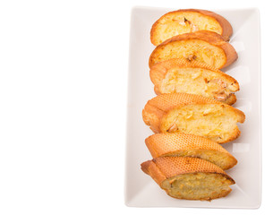Homemade garlic bread of French baguette slices 