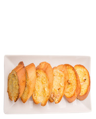 Homemade garlic bread of French baguette slices 