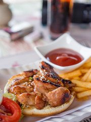 Yummy chicken burger with fries