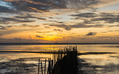Fototapeta na wymiar Dawn at the seaside when low tide