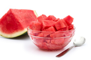 one piece and a bowl of watermelon on a white background