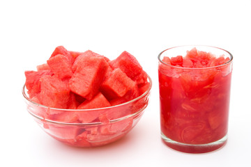 bowl and cup of watermelon on a white background