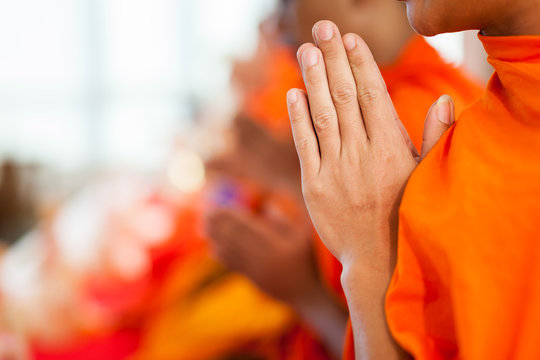 Monk's hand in Buddhism ceremony