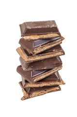 Heap of chocolate pieces on white background