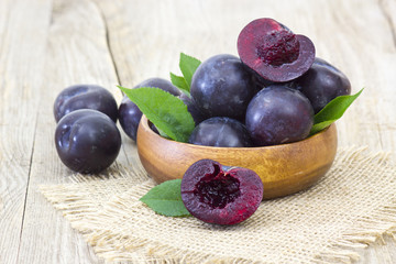 fresh plums in a bowl