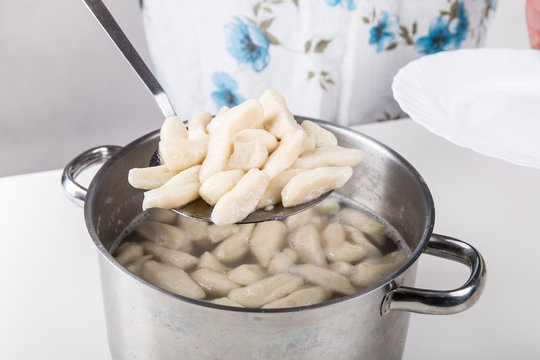 Cooking traditional polish noodles - kopytka