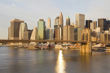 Fototapeta na wymiar Brooklyn Bridge in sunrise with Lower ManhattanUSA