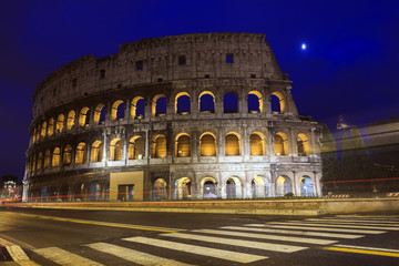 Fototapeta na wymiar Colosseum at dusk in Rome