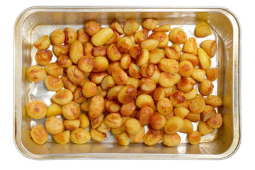 Roast potatoes in large aluminium dish