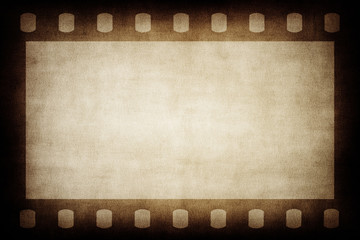 Grunge brown film strip background.