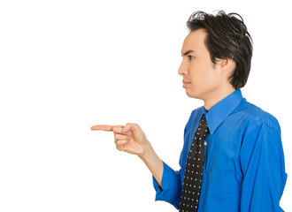 Side profile serious man, pointing with index finger at someone