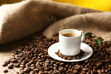 Cup of coffee on wooden table