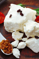 Feta cheese on table close-up