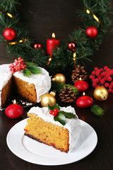 Slice of cake covered cream with Christmas decoration