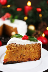 Slice of cake covered cream with Christmas decoration