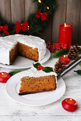 Slice of cake covered cream with Christmas decoration