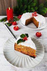 Slice of cake covered cream with Christmas decoration