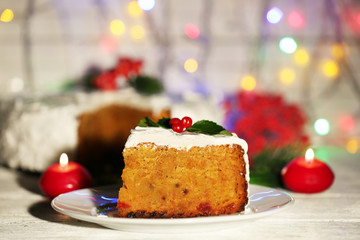 Slice of cake covered cream with Christmas decoration