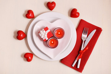 Festive table setting for Valentines Day on light background