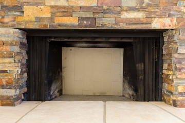 Fototapeta na wymiar Stone Fireplace Closeup