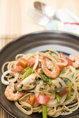Stir fried spicy spaghetti with seafood