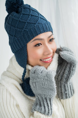 Asian woman in warm clothes