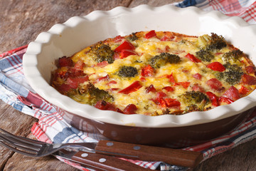 casserole with broccoli, pepper and bacon. Horizontal